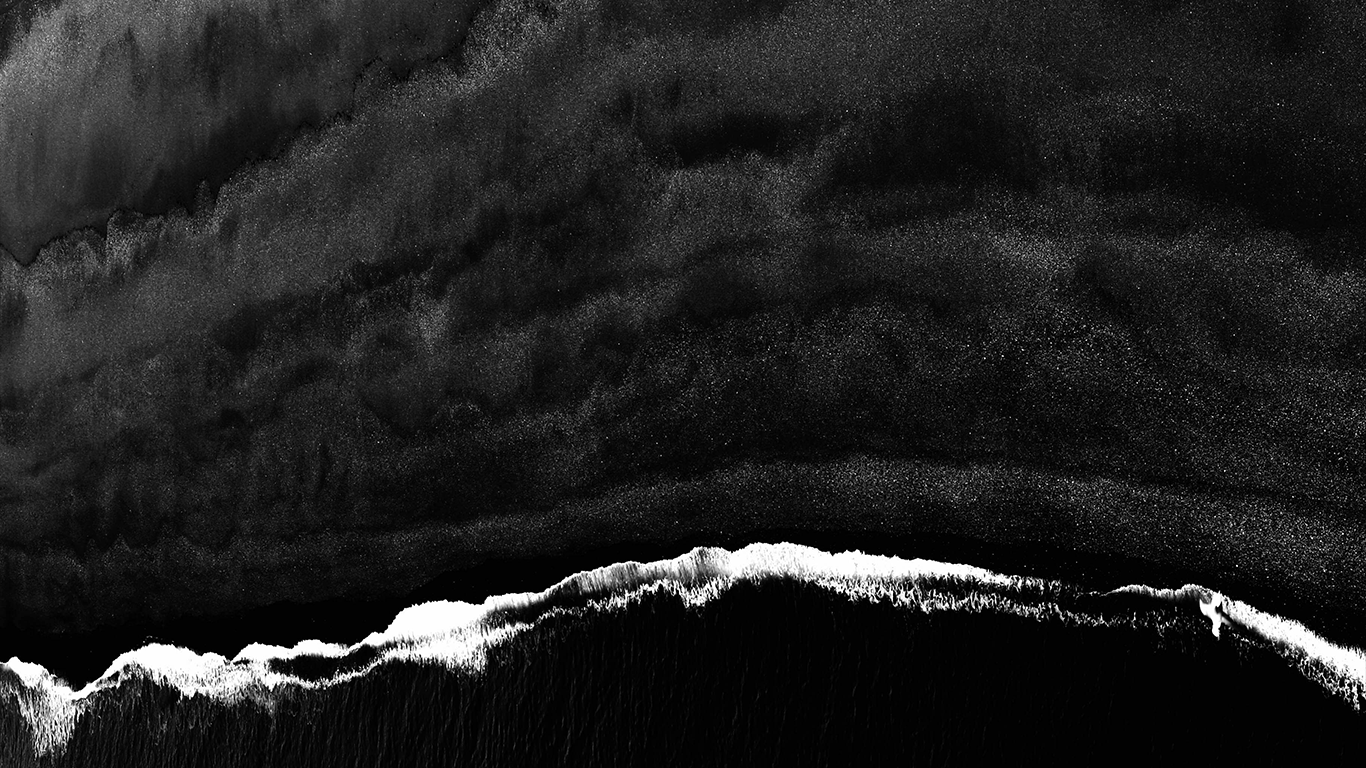 Black and white textured piece of artwork, looking like the sea.