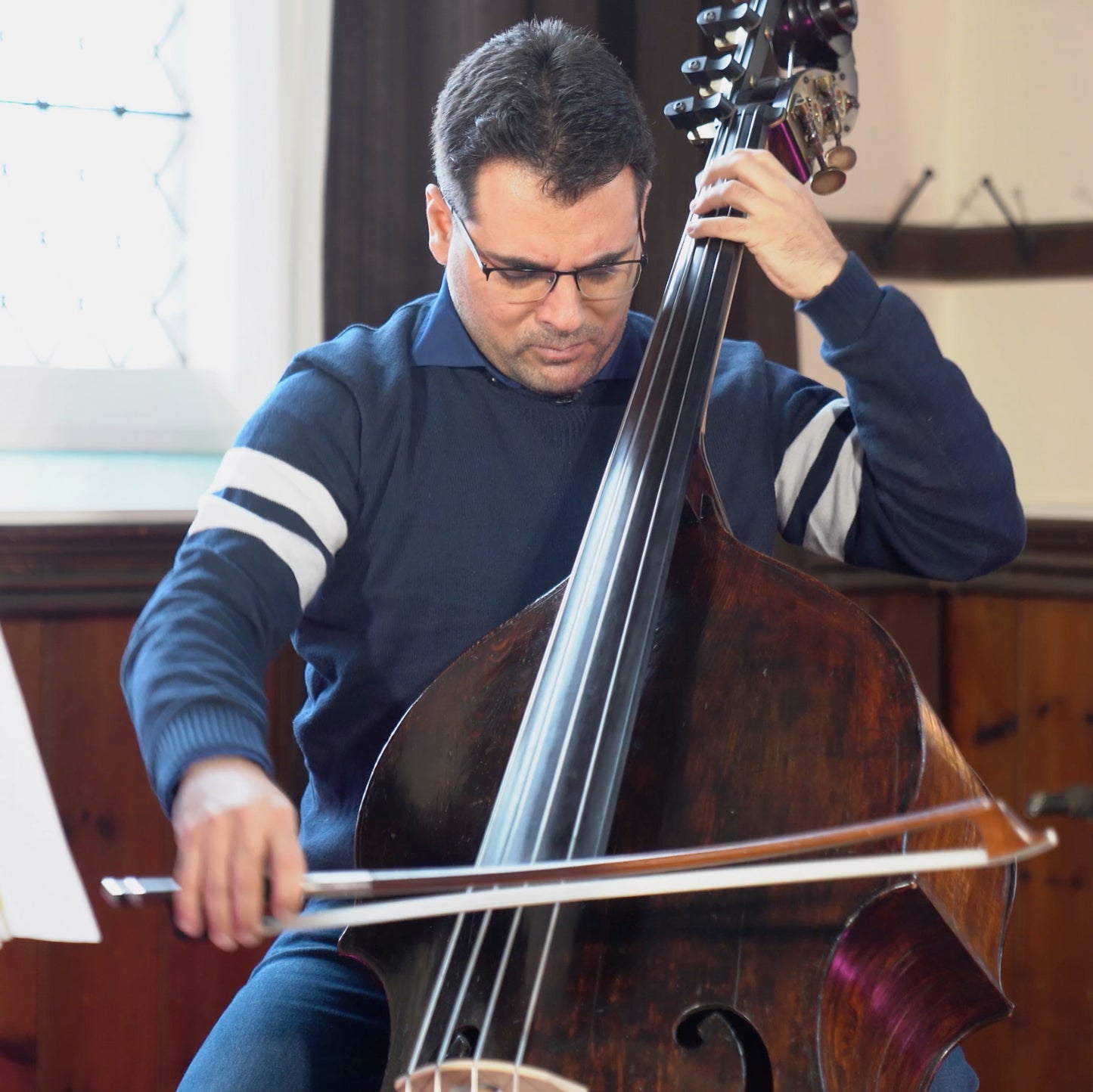 Gerardo Scaglione playing the double bass.