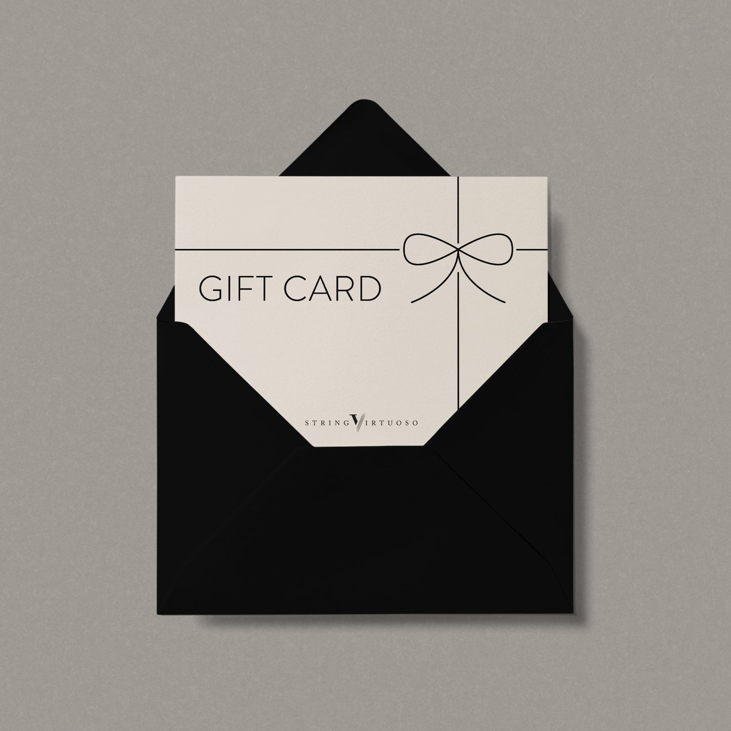 A digital gift card with a black envelope, displaying 'Gift Card' text and a decorative bow on the front.