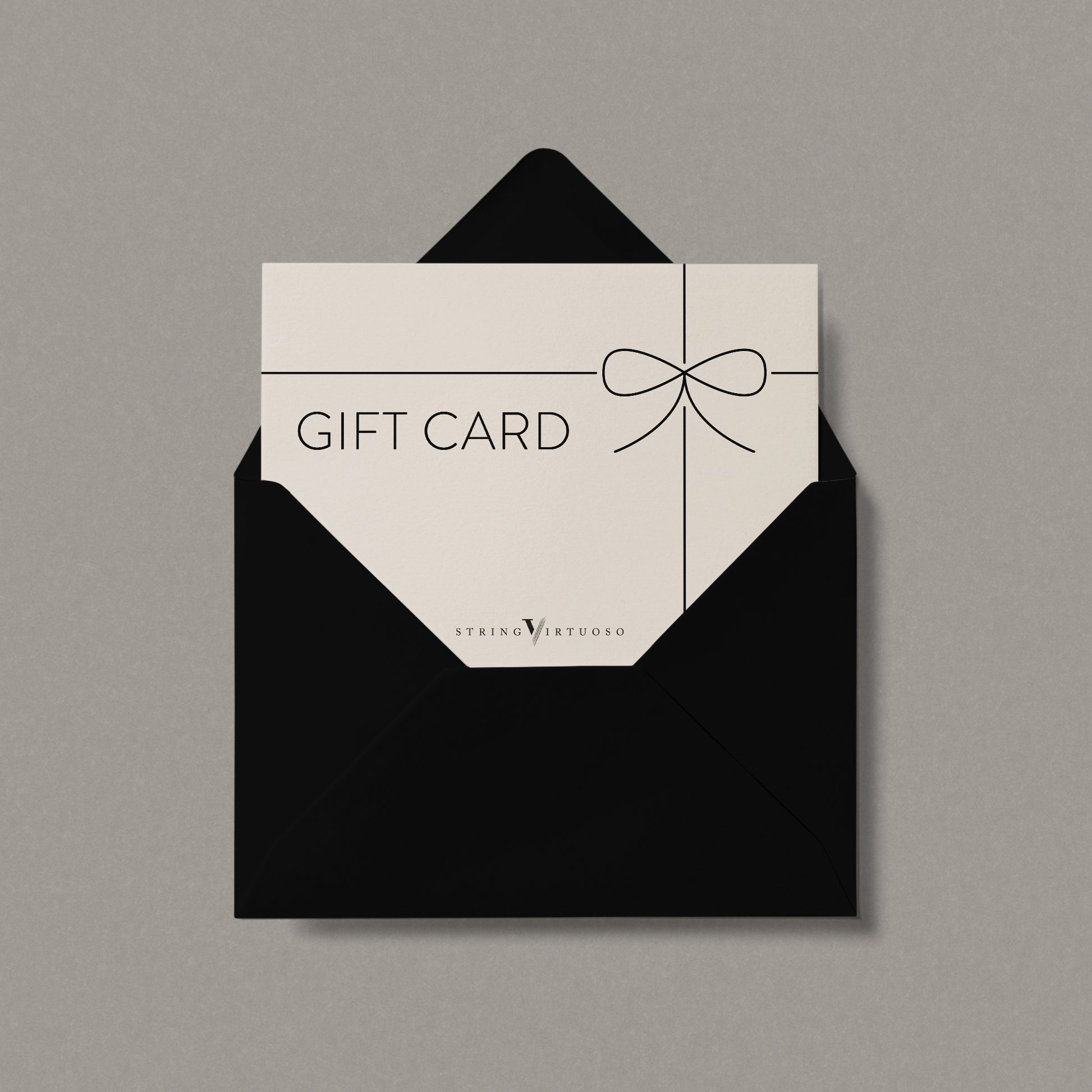 A digital gift card with a black envelope, displaying 'Gift Card' text and a decorative bow on the front.