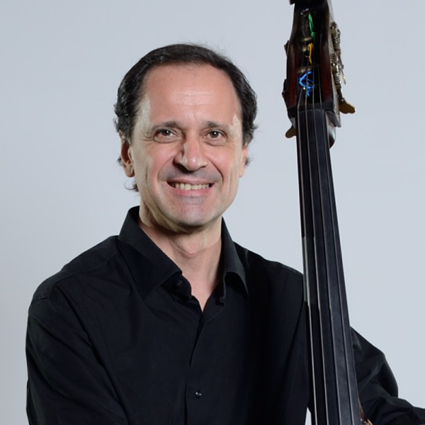 Giuseppe Ettorre holding a double bass