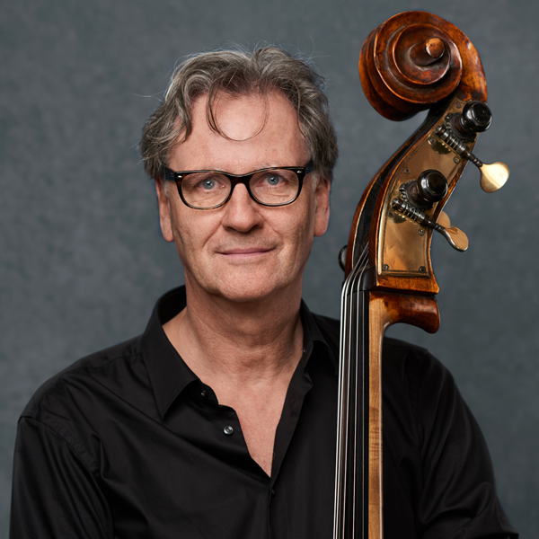 Holger Michalski holding a double bass