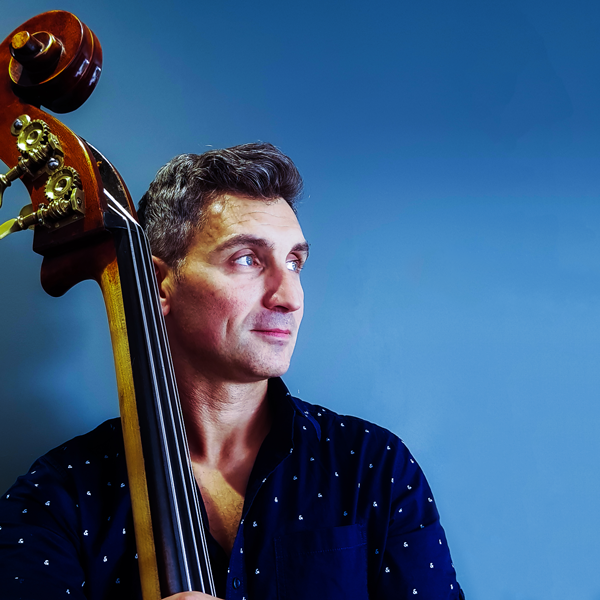 Jean Baptiste Salles holding a double bass