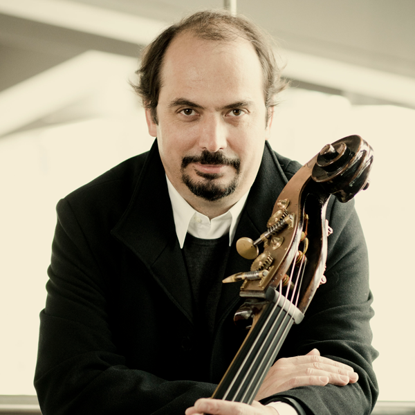 Petru Iuga holding a double bass