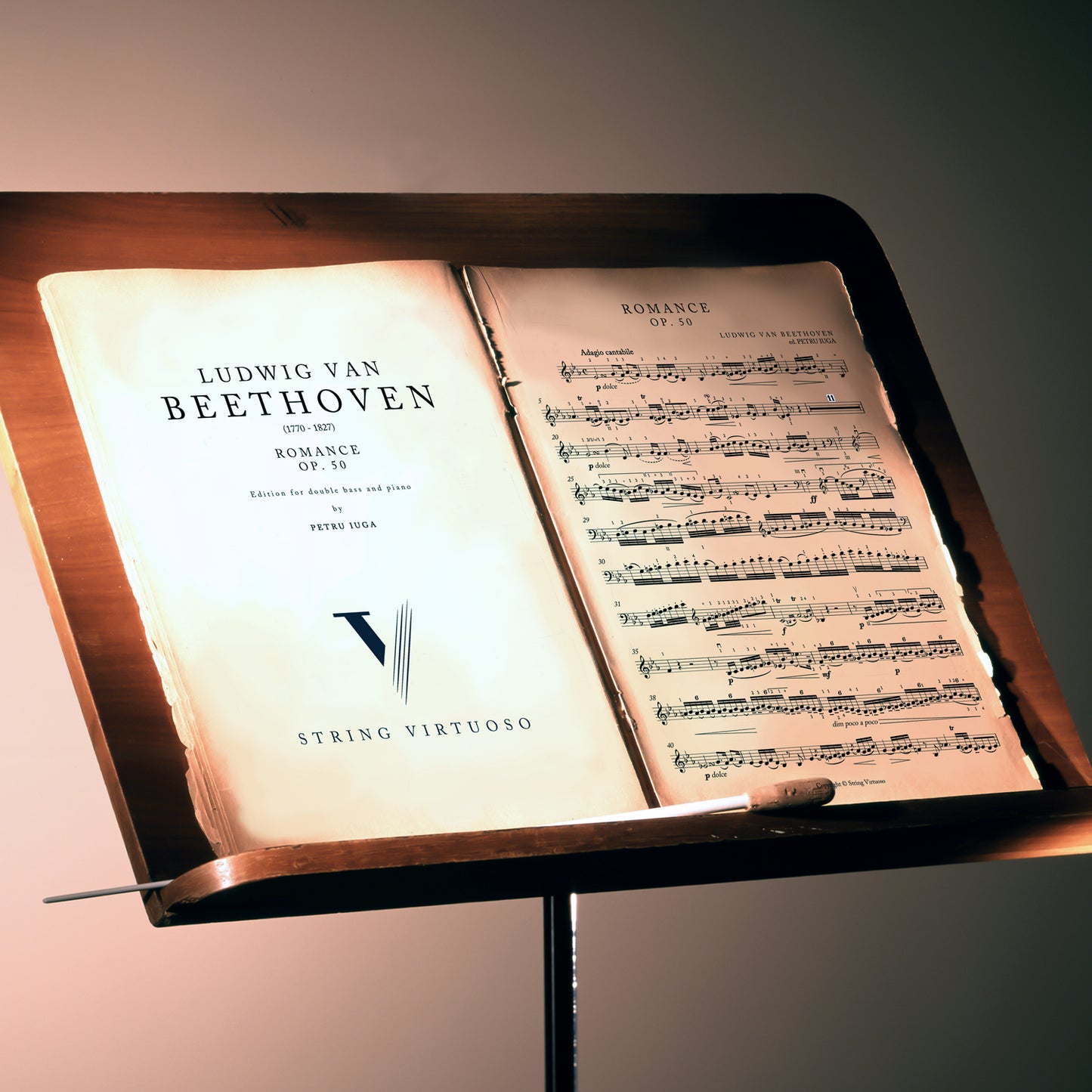 Sheet music on a stand by Ludwig Van Beethoven, on Romance op. 50 edition for double bass and piano by Petru Iuga.