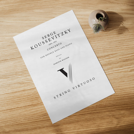 A printed sheet of music with the title 'Serge Koussevitzky Concerto' for double bass and piano, featuring the name 'Dominik Wagner' as the composer. The sheet music is placed on a wooden surface with a decorative item to the side.