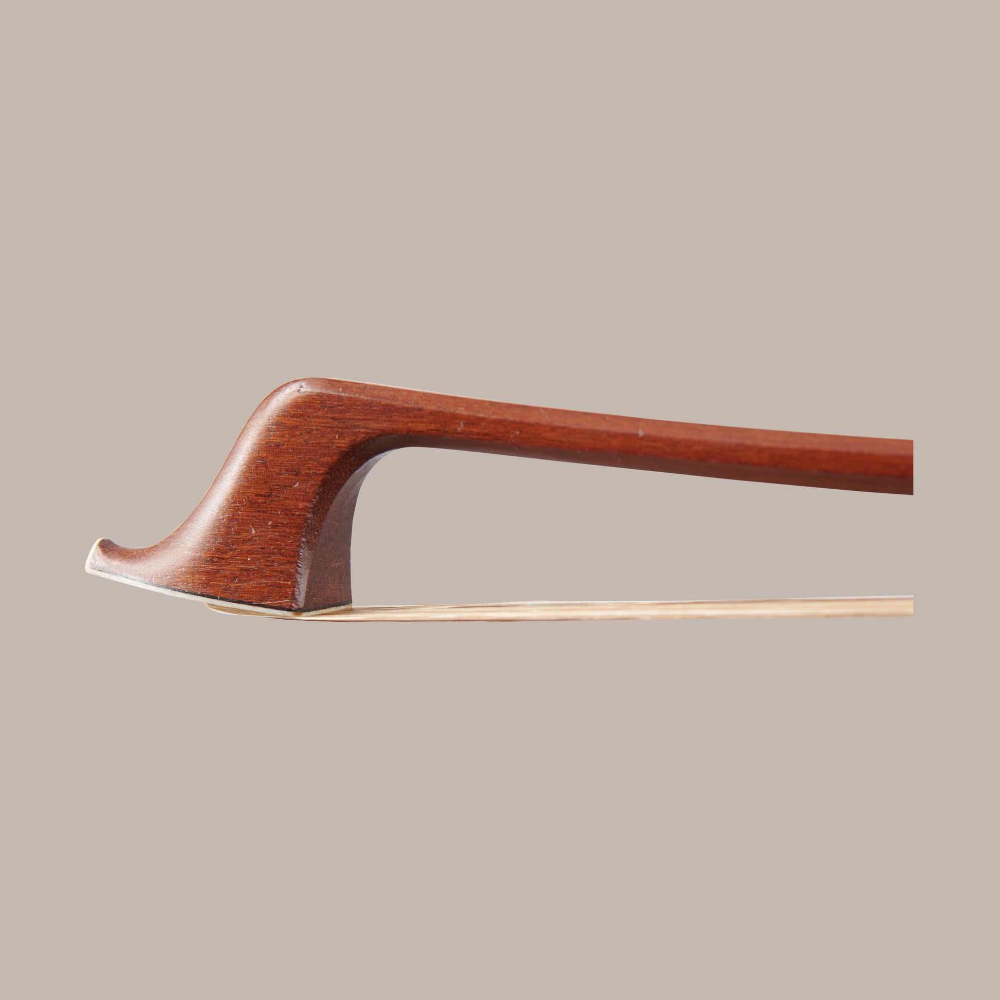 L.  Morizot c.1950 Double Bass Bow - Head on a angle on a beige background