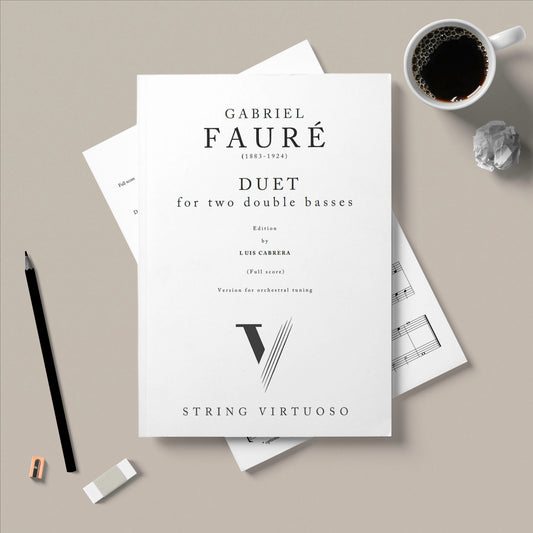 Music sheet for Gabriel Faure's 'Duet' with a cup of coffee and pencil on a gray surface